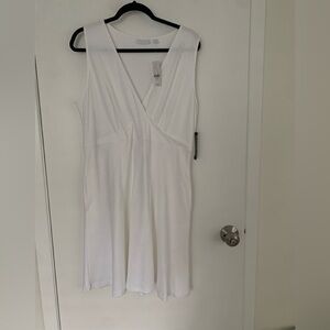 NWT white cotton sleeveless fit and flare dress with pockets!